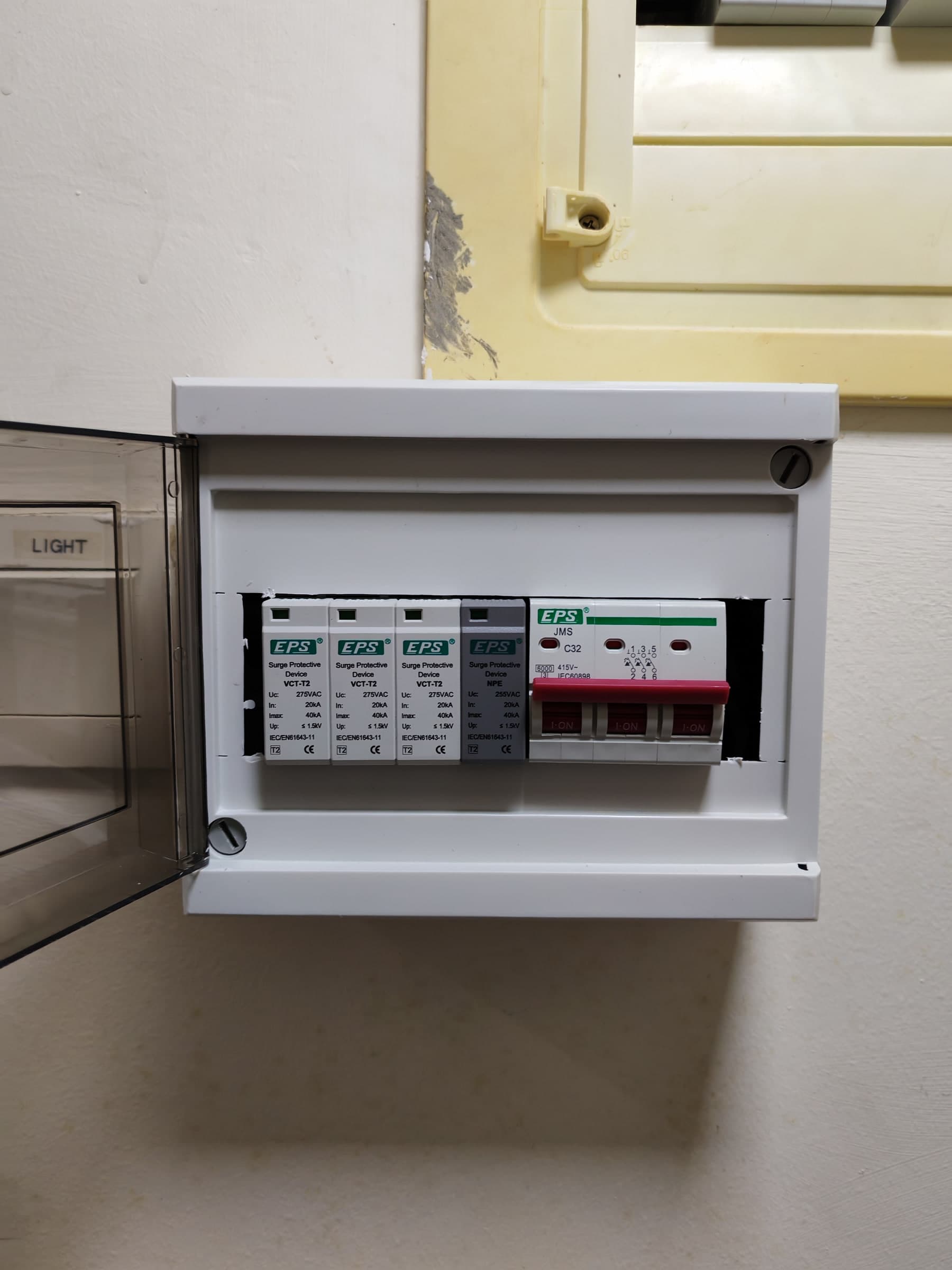 FastFix SPD installation photo showing surge protection devices in a surface-mounted distribution board.